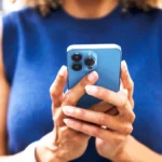 Close up of woman using smart phone