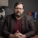 brandon-sanderson-illuminates-the-hidden-cost-of-ai-art-at-dragonsteel-nexus-sparking-debate-on-human-creativity-and-agency