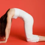 Woman in Cat/Cow Pose