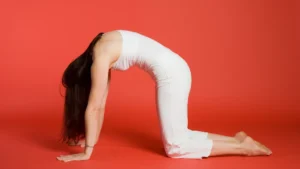 Woman in Cat/Cow Pose